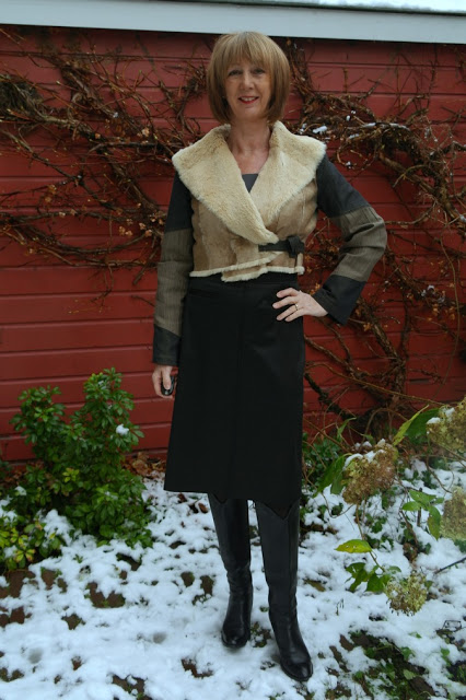 Fur jacket with charcoal skirt