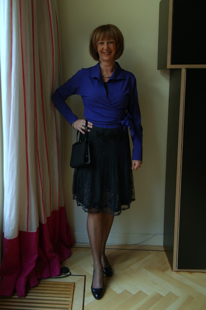Party skirt with purple blouse and cream blouse