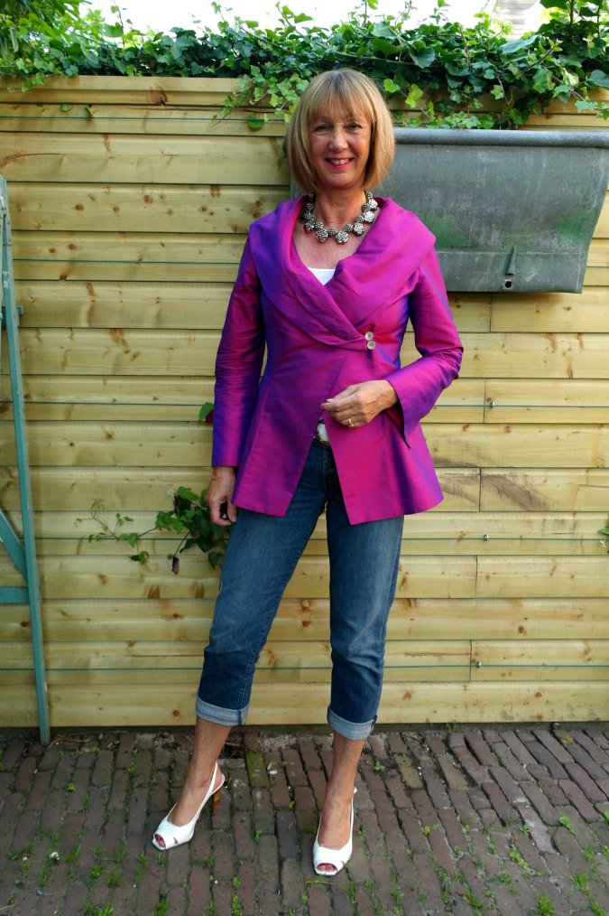 Purple silk jacket with distressed jeans and white slingbacks