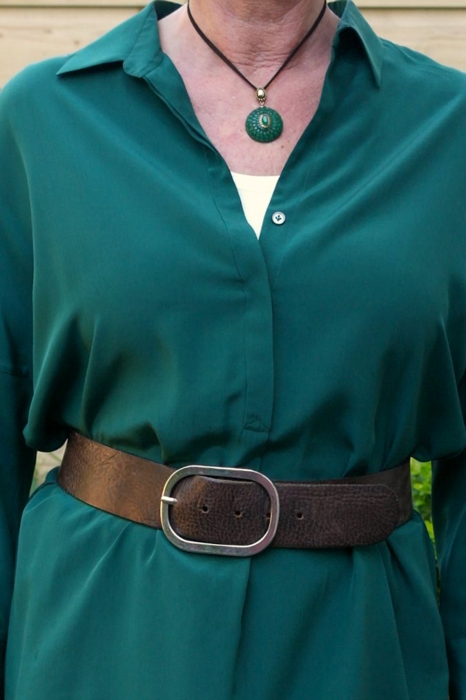 Brown belt and green pendant a