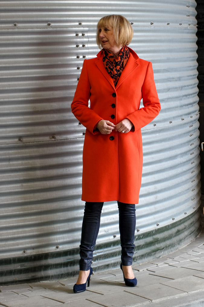 Orange coat by Claudia Sträter