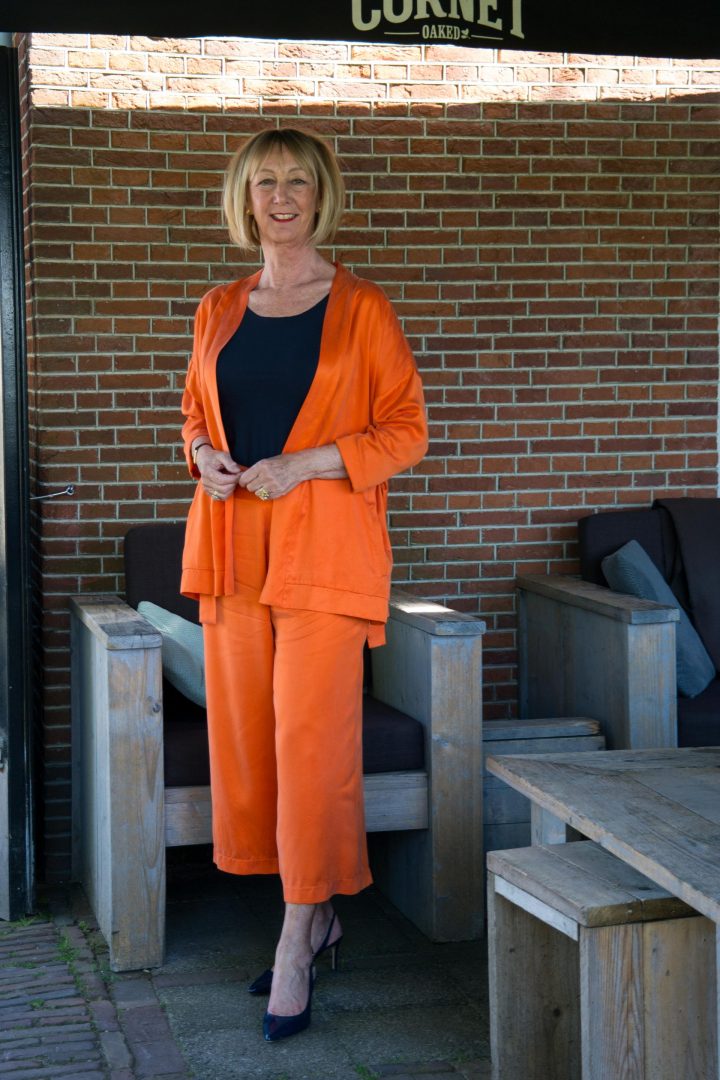 Orange trouser suit