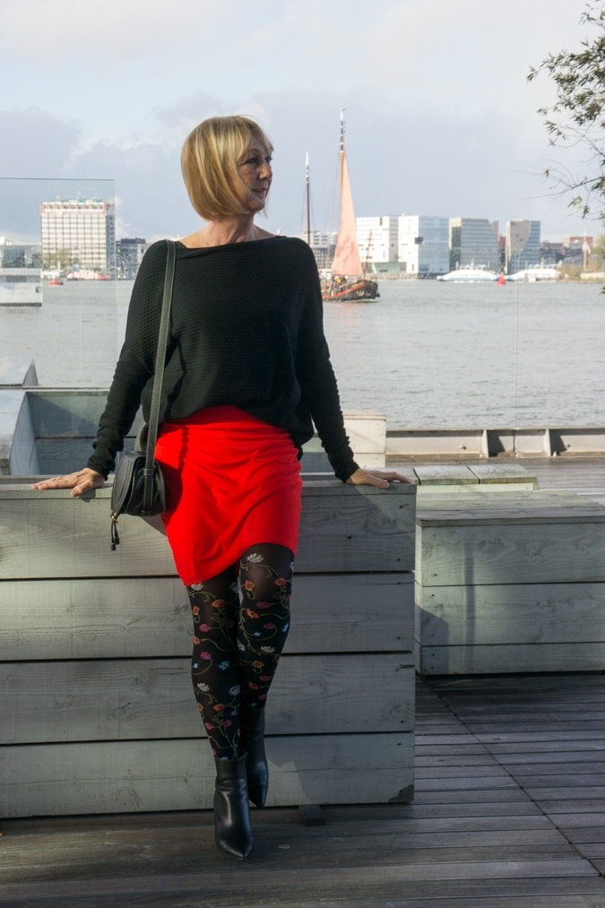 Floral tights with a red skirt