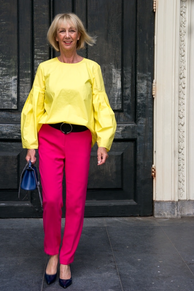 Bright pink trousers with lemon yellow top