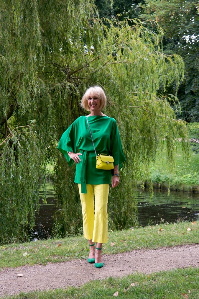 Lemon yellow trousers with a green kimono top
