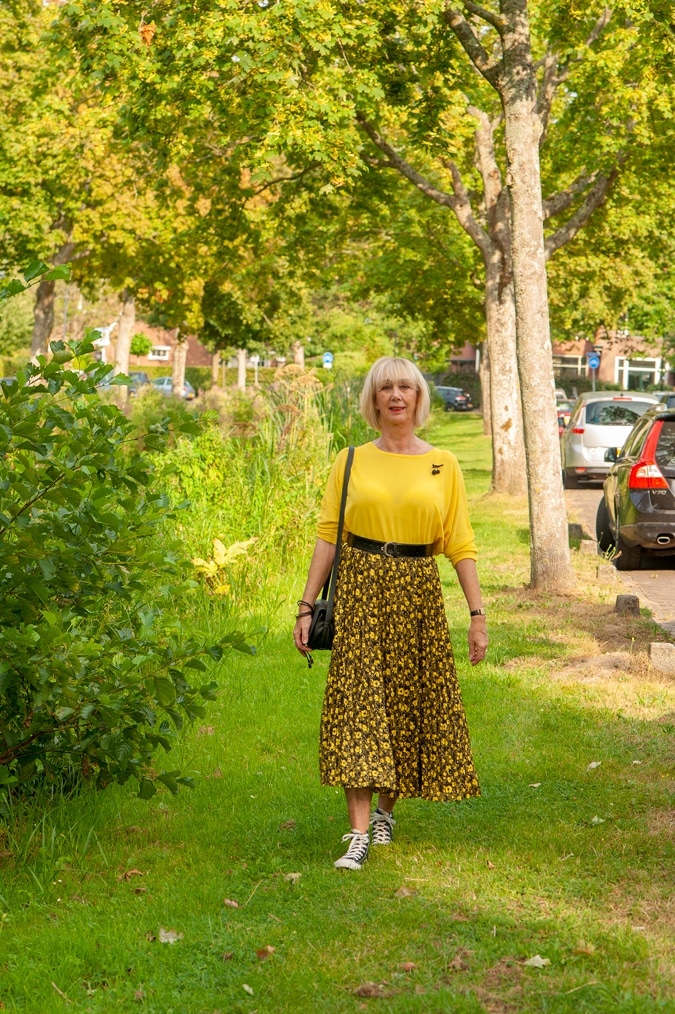 Yellow and black pleated skirt