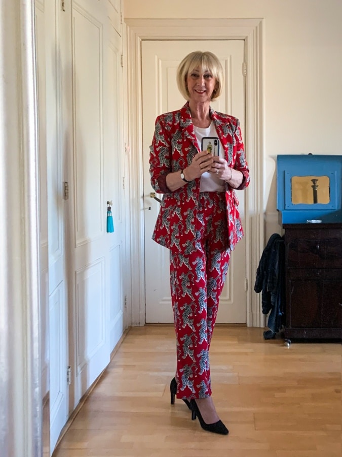 Red trouser suit with tigers