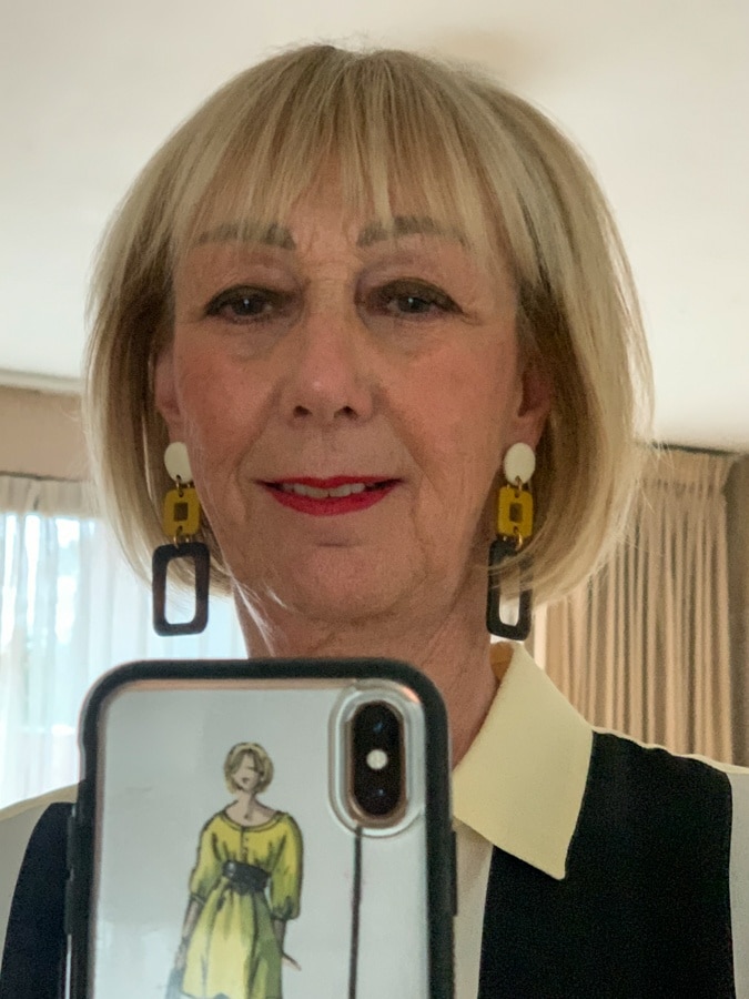 White yellow and black earrings