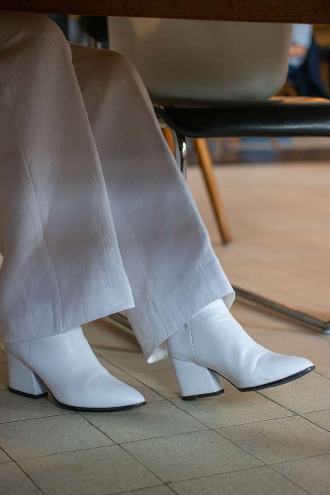 wide white trousers with white boots