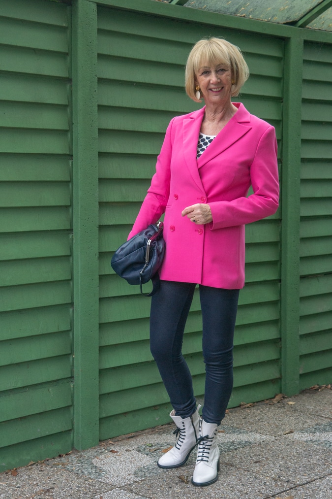 Bright pink blazer with blue leggings