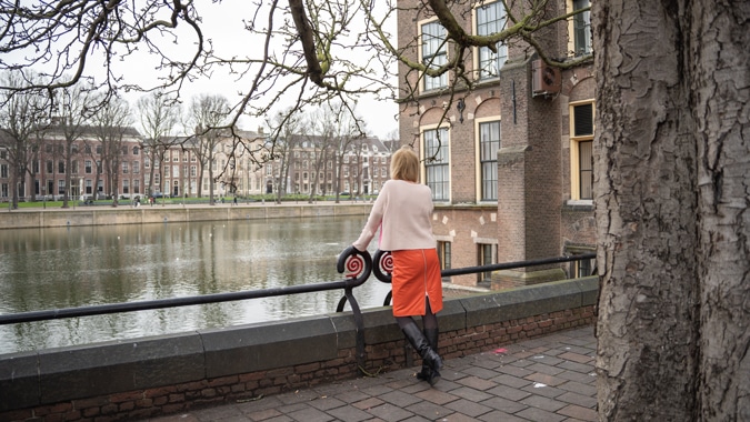 Orange leather skirt with pink jumper