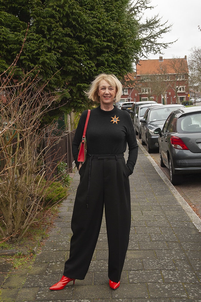 Wide black trousers with a black fitted top
