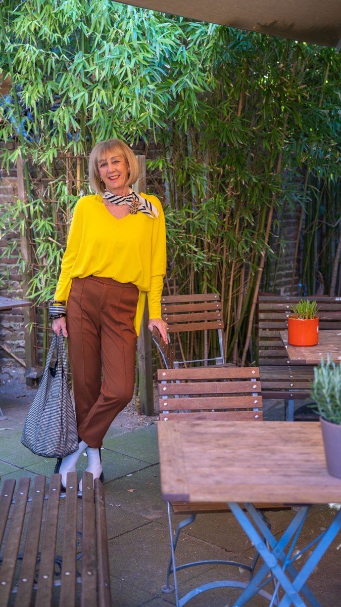 Cognac coloured trousers with yellow Kenzo jumper
