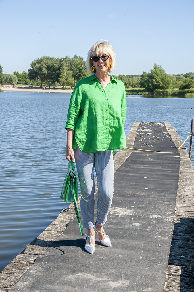 Bright green shirt with blue and white pinstripe trousers
