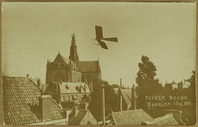 Anthony Fokker, flying around the Saint Bavo church