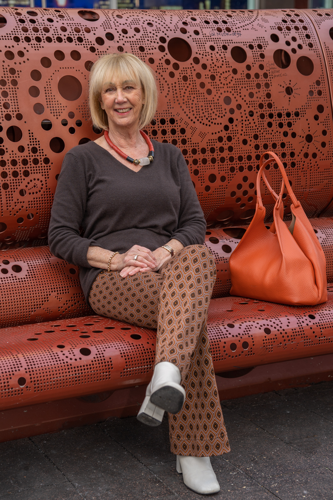 Brown jumper with patterned trousers