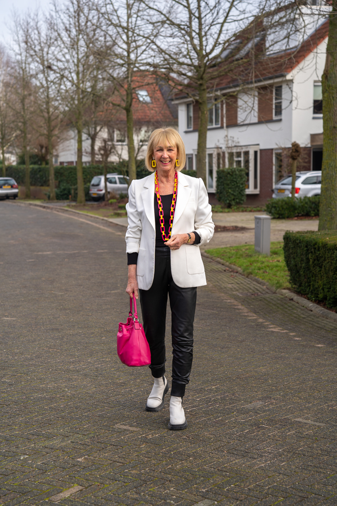 Leather trousers with a white blazer