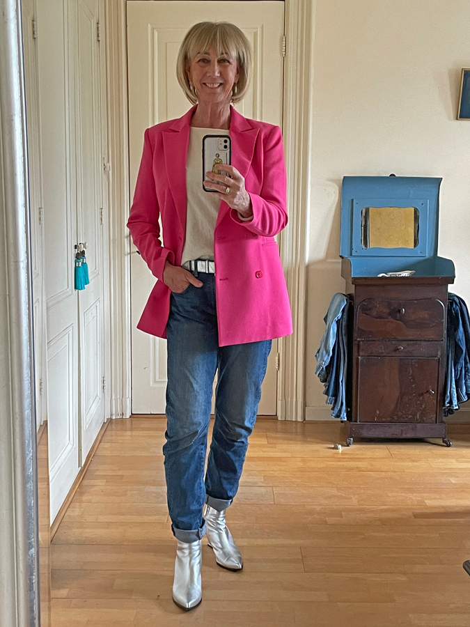 Bright pink blazer with jeans
