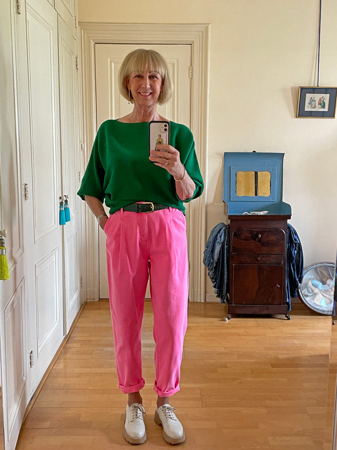 Pink trousers with green jumper