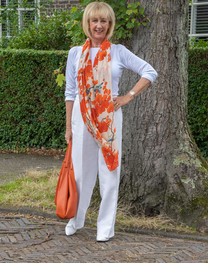 White monochrome outfit with a colourful scarf