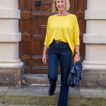 Flared jeans with a yellow top