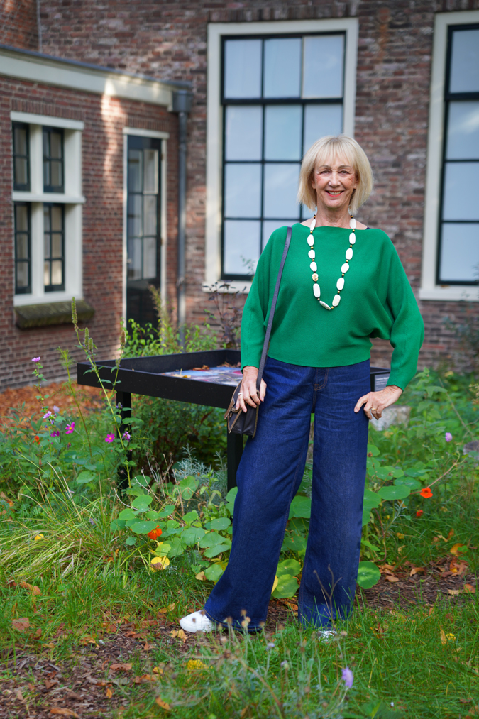 Wide leg jeans with a green jumper