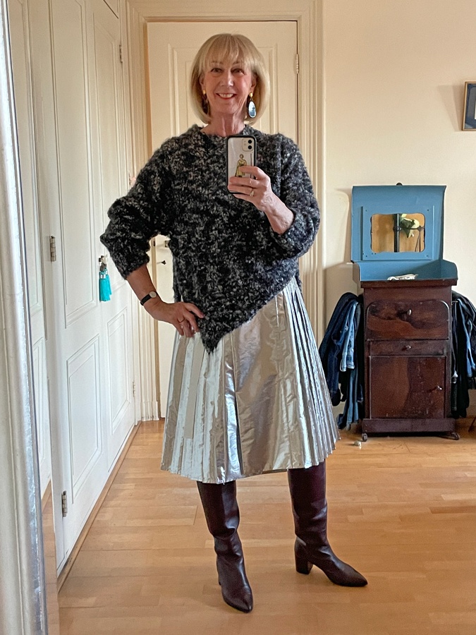 Silver pleated skirt with burgundy boots