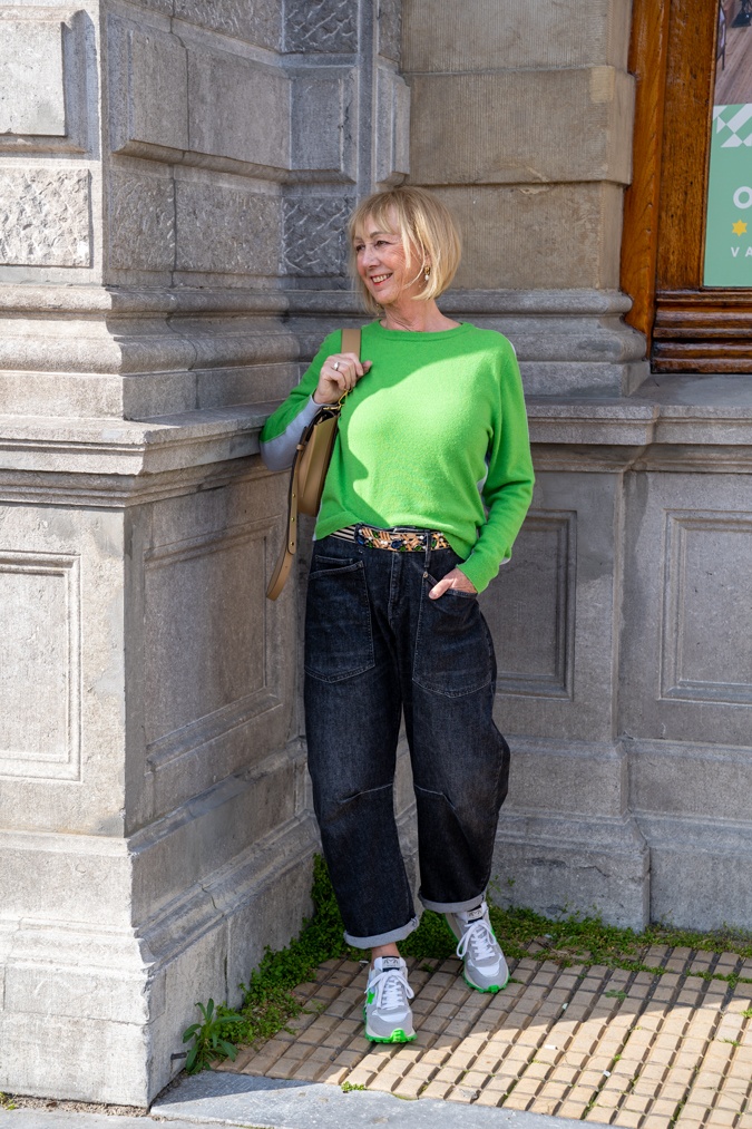 Man repeller jeans with green and blue jumper