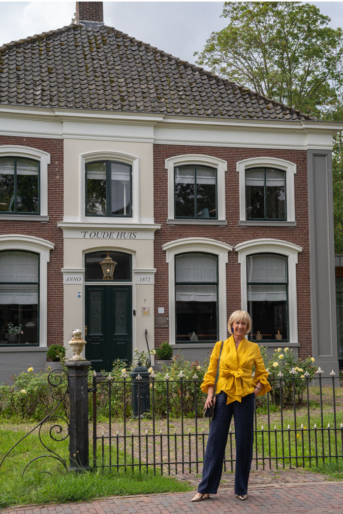 Golden yellow blouse with blue linen trousers