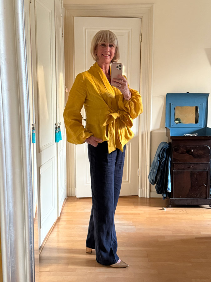 Golden yellow blouse with blue linen trousers