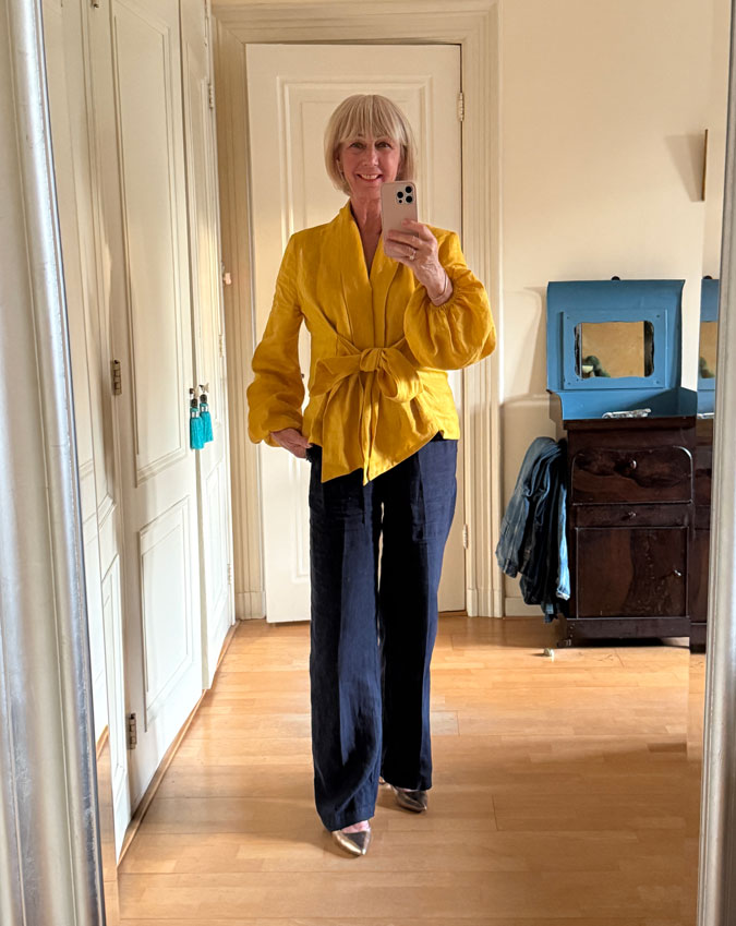Golden yellow blouse with blue linen trousers