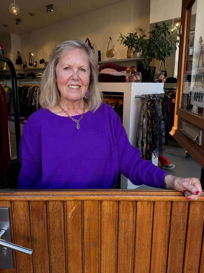 Marjolein at the shop door window