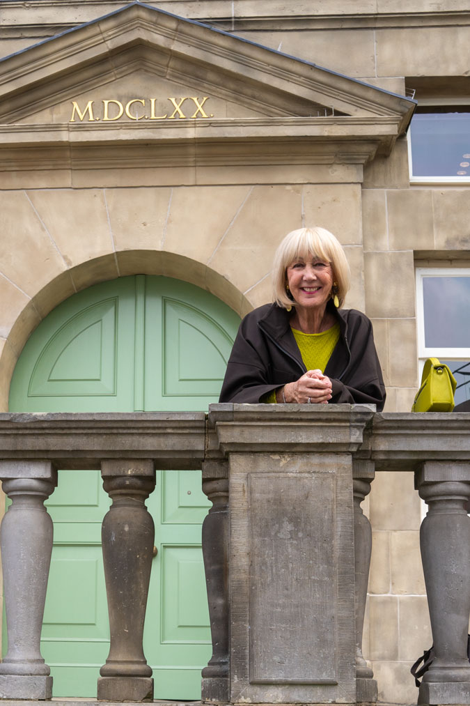 Brown swing jacket with brown vegan leather trousers