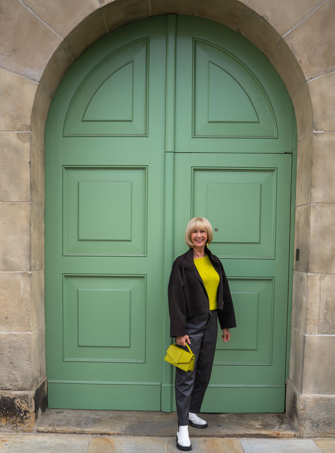 Brown swing jacket with brown vegan leather trousers