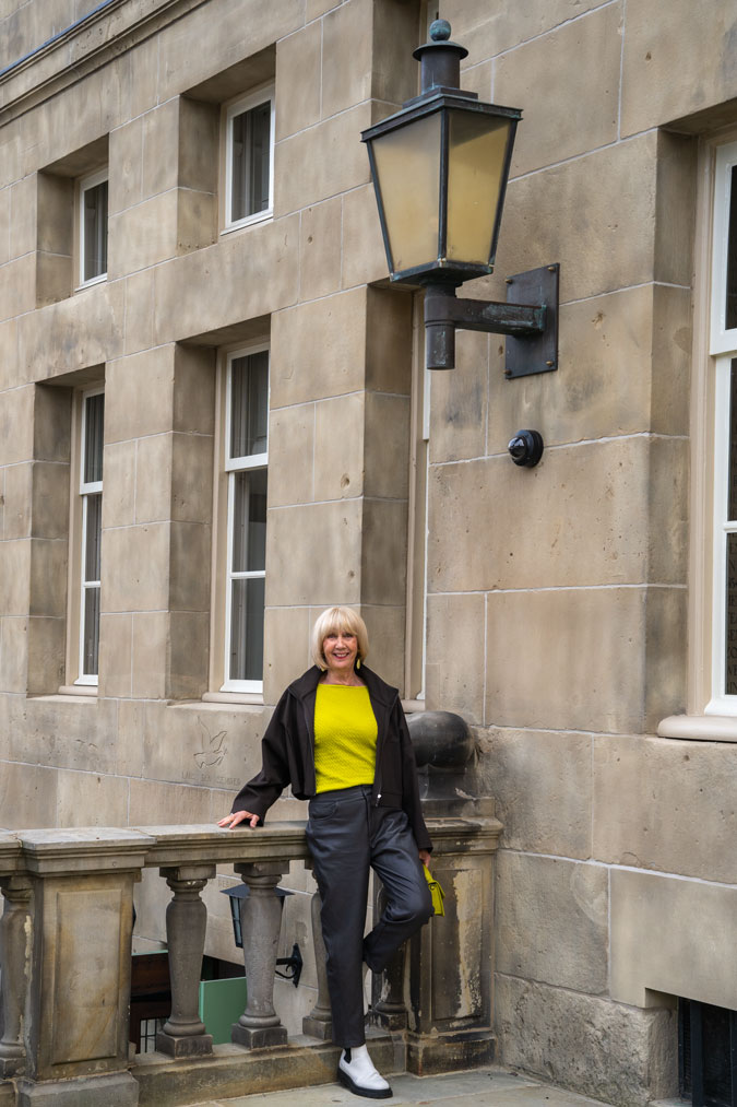 Brown swing jacket with brown vegan leather trousers
