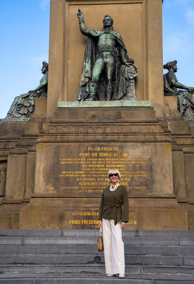 Cream trousers with a green top
