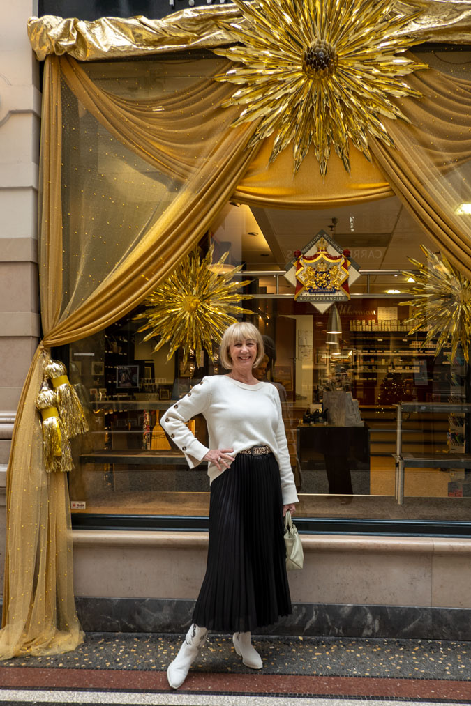 Black pleated skirt with cream jumper