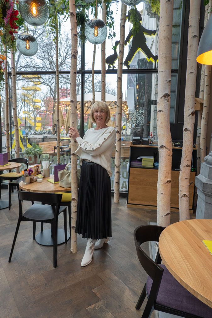 Black pleated skirt with cream jumper