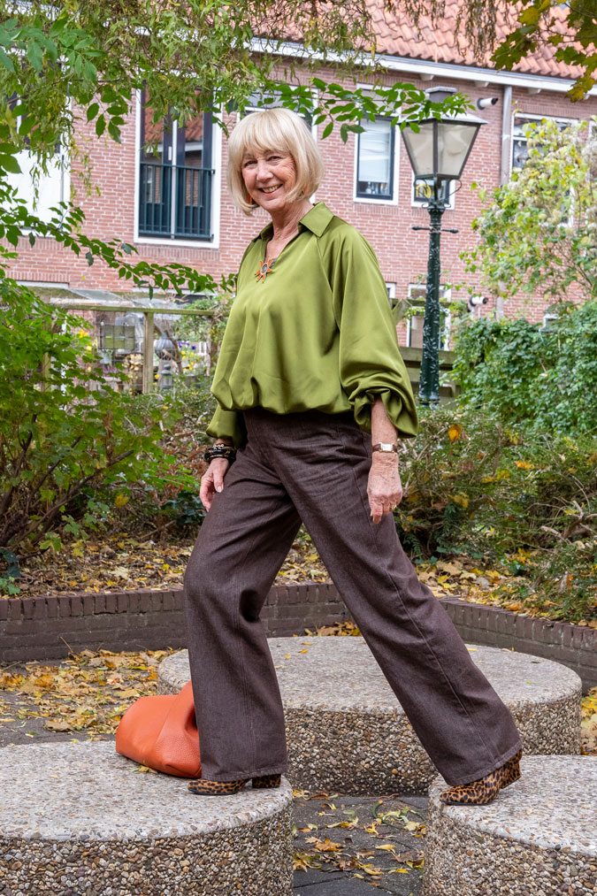Brown jeans with a green top