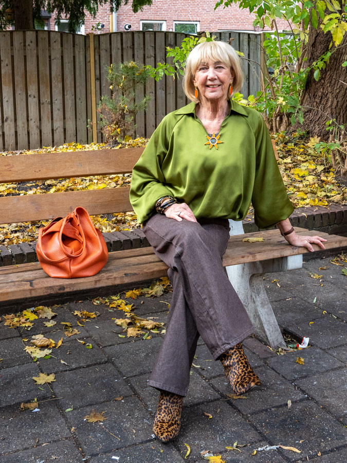 Brown jeans with a green top