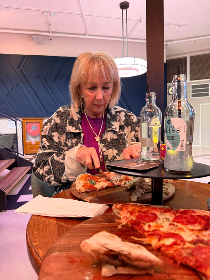 Eating pizza at The Koepel film theatre