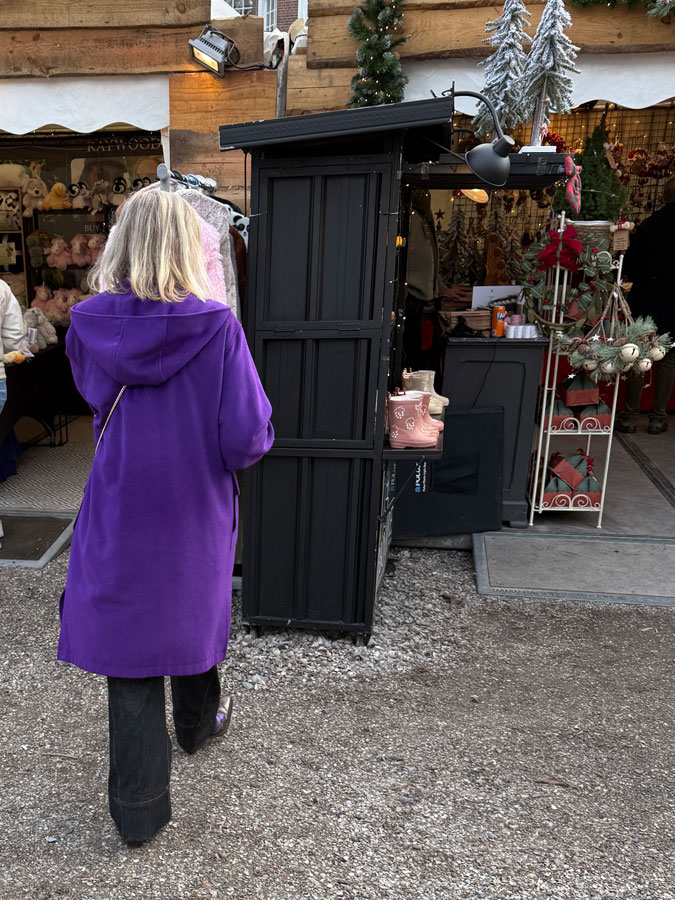 Purple coat Marjolein seen at the back