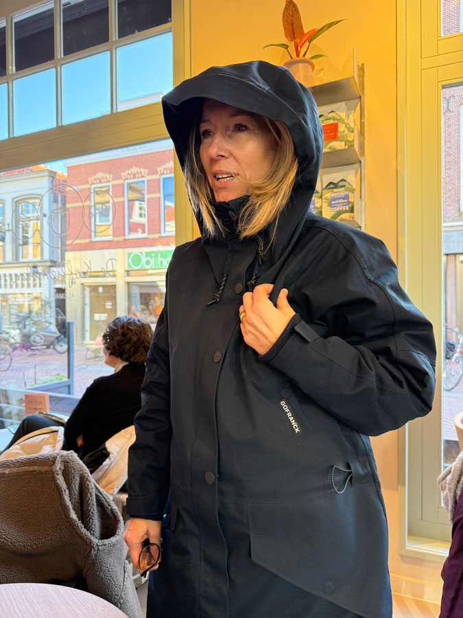 Sabine, trying on Anke's coat