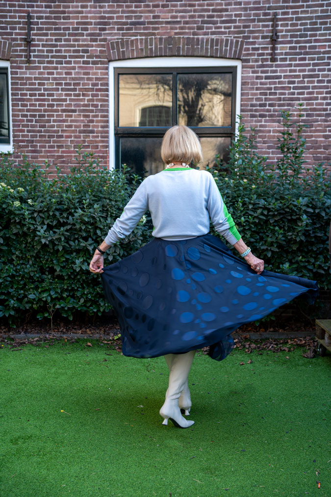 Wide blue skirt with a green jumper