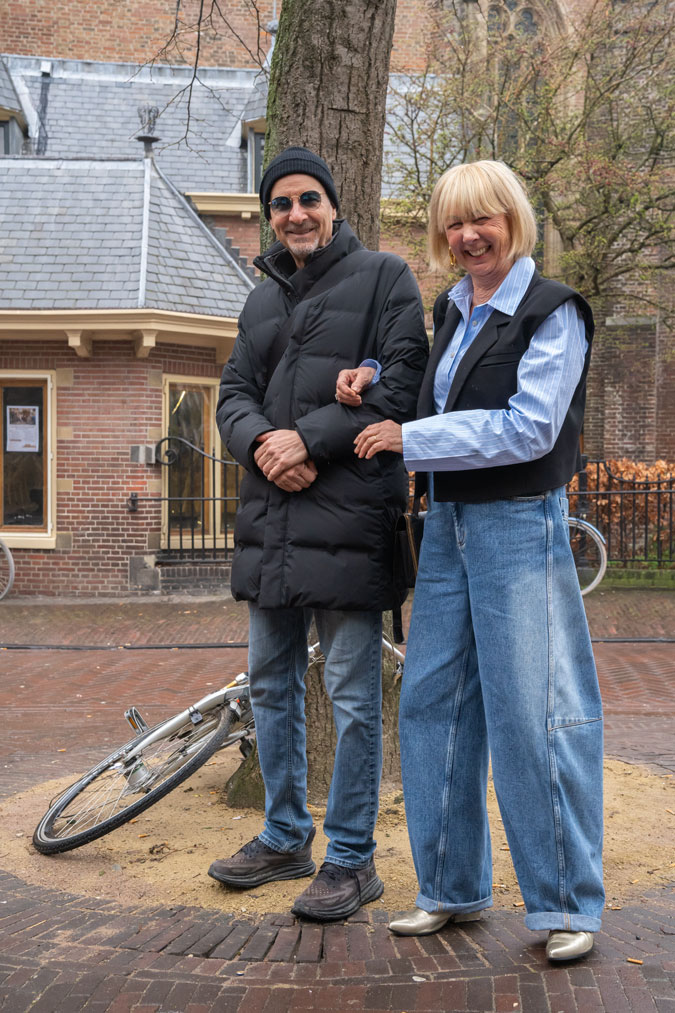 Black waistcoat with blue and white striped shirt