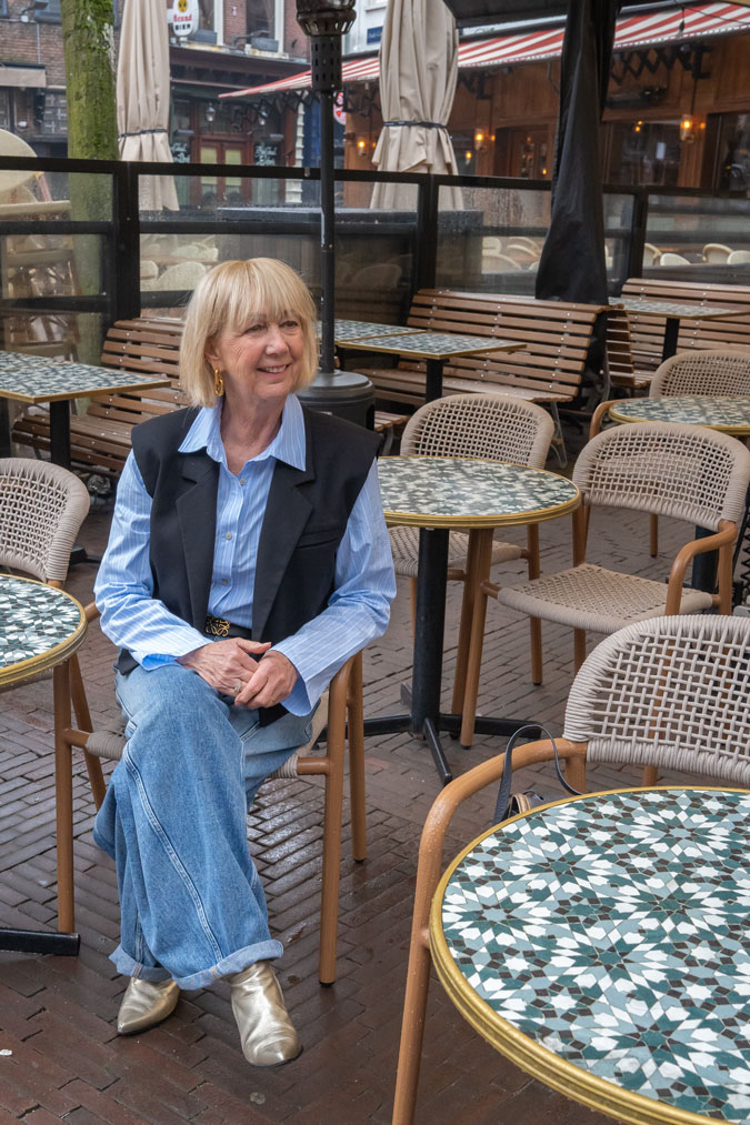 Black waistcoat with blue and white striped shirt