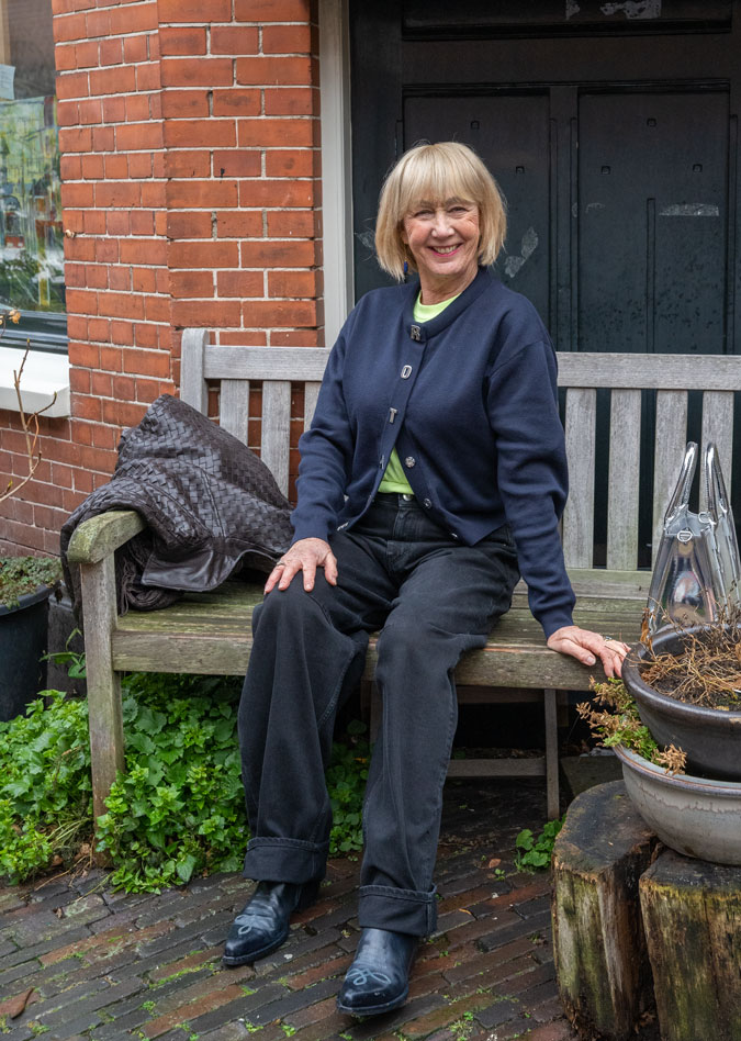 Blue cardigan and black wide leg jeans