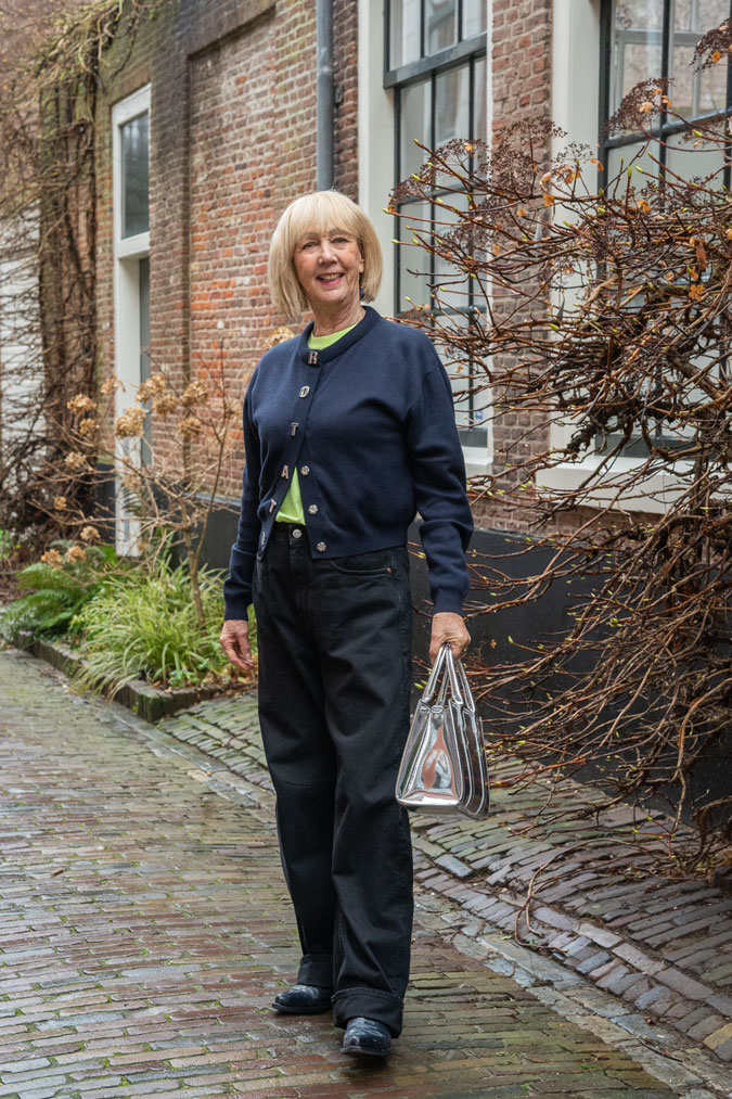 Blue cardigan and black wide leg jeans