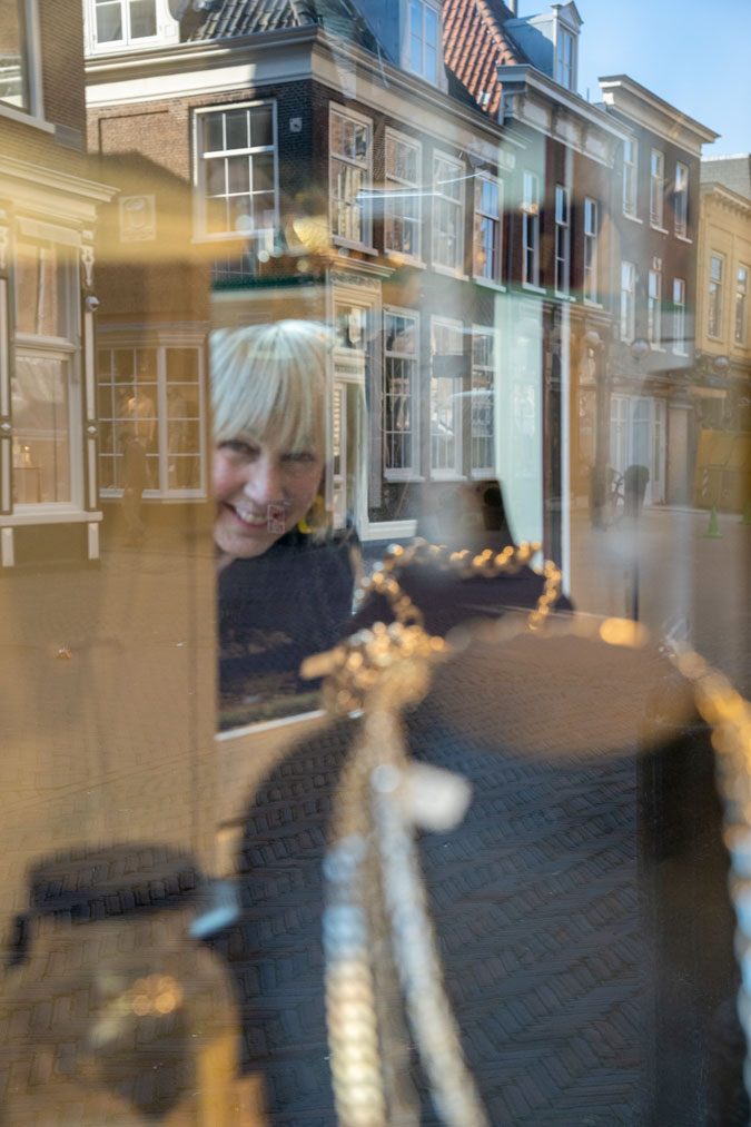 Blue cardigan and black wide leg jeans