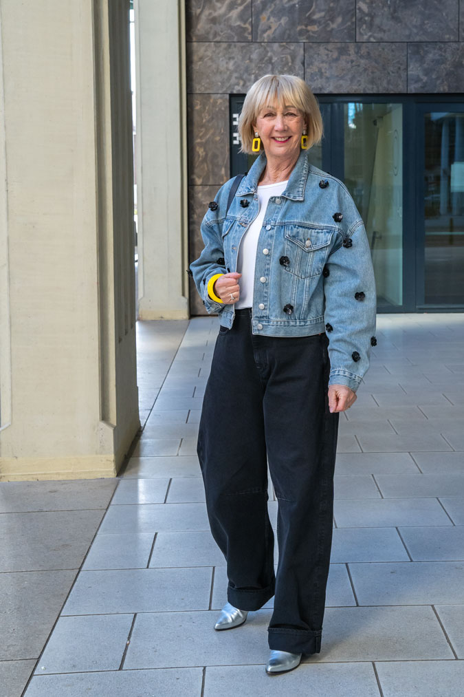 Jeans jacket and black wide leg jeans